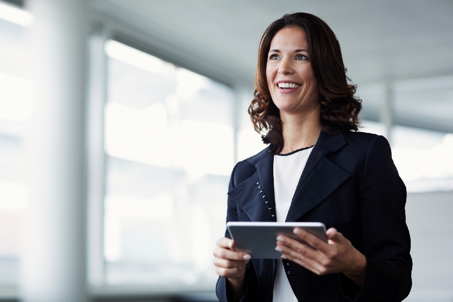 A woman using a tablet for work